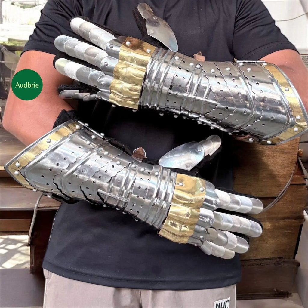 Handcrafted articulated medieval steel gauntlets with brass knuckle plates worn on arms