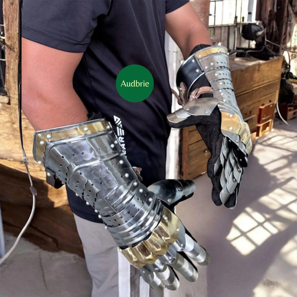 Handcrafted articulated medieval steel gauntlets with brass knuckle plates worn on arms
