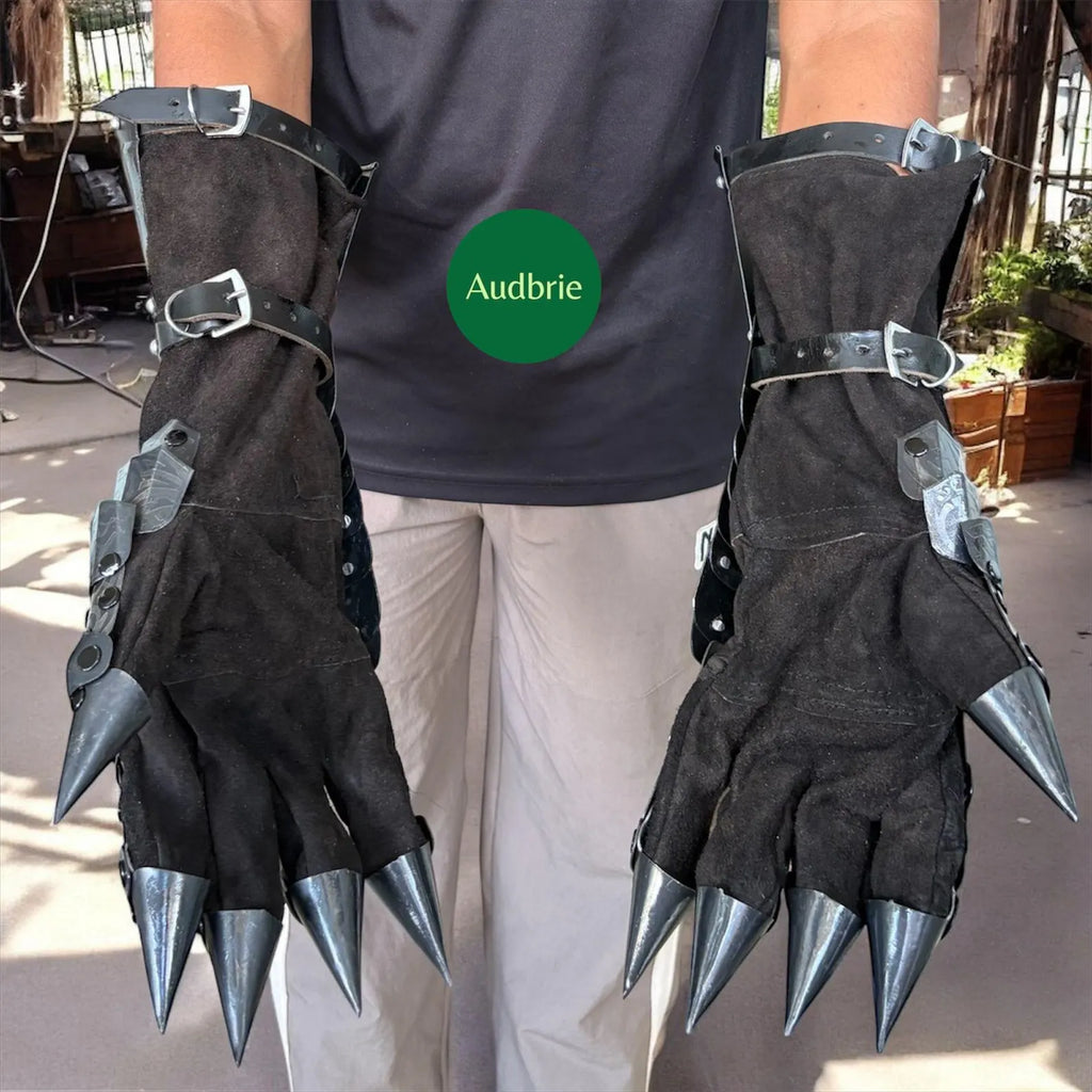 Handcrafted articulated medieval steel gauntlets with brass knuckle plates worn on arms