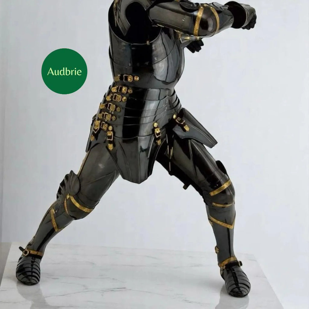Black and gold armored figure on a white background with 'Audbrie' branding.