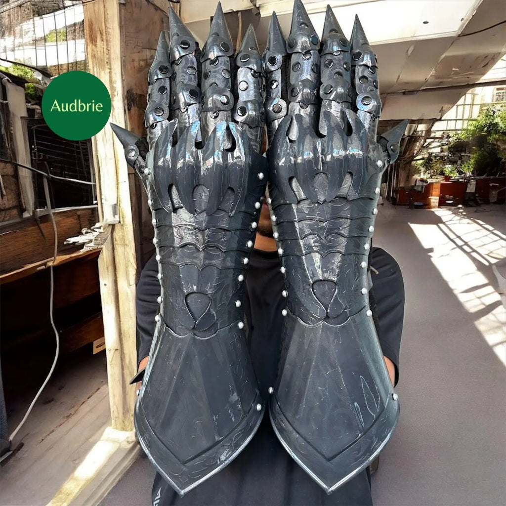 Handcrafted articulated medieval steel gauntlets with brass knuckle plates worn on arms