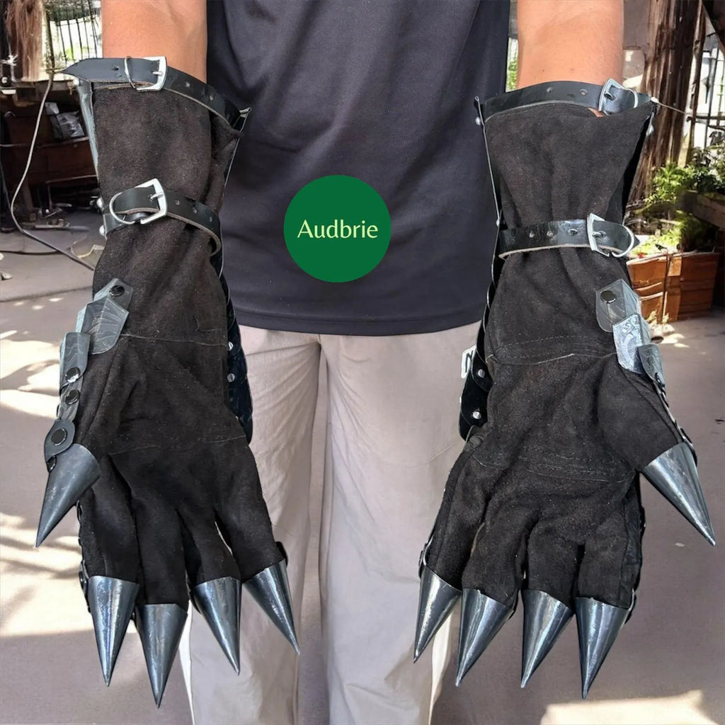 Handcrafted articulated medieval steel gauntlets with brass knuckle plates worn on arms