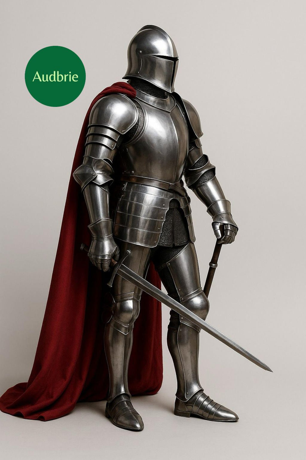 Person in full medieval armor holding a sword on a plain background