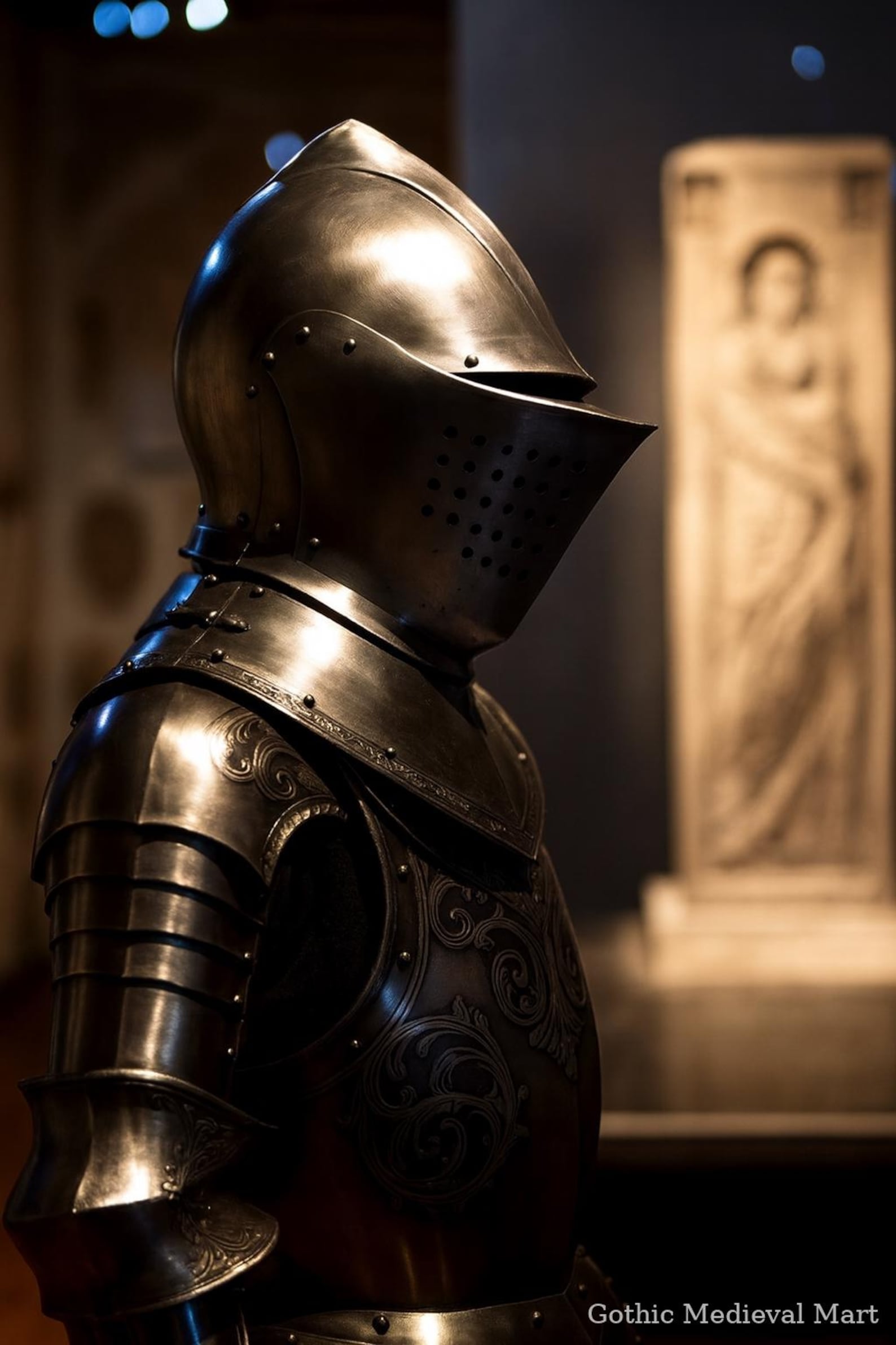 Close-up of a detailed suit of armor with a blurred background
