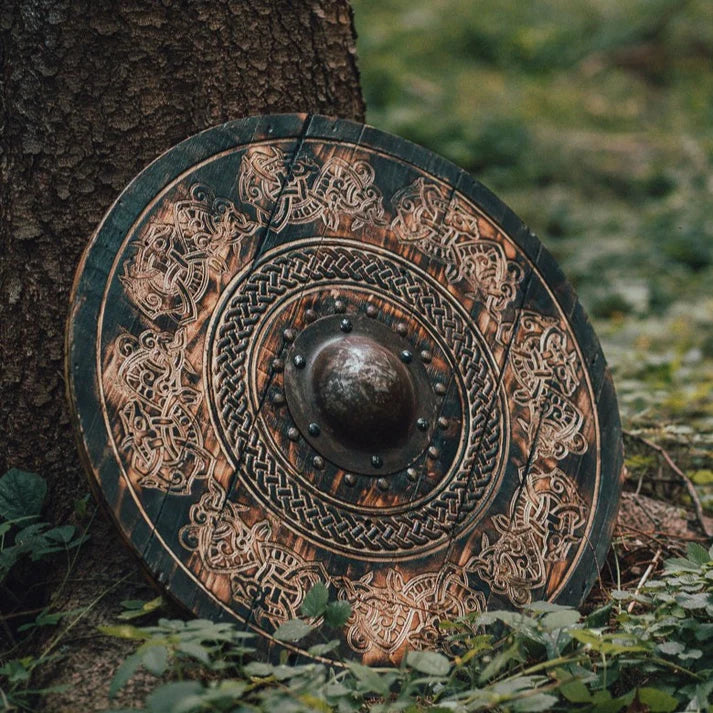Authentic Norse-style carved wooden shield for wall display or reenactment